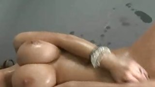 Lubed honey pushes her fake..